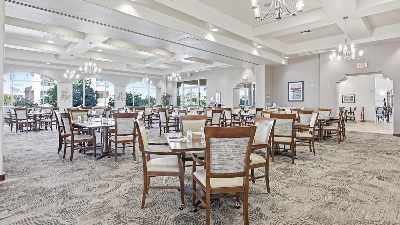 The dining room at The Peaks at Santa Rita set for mealtime