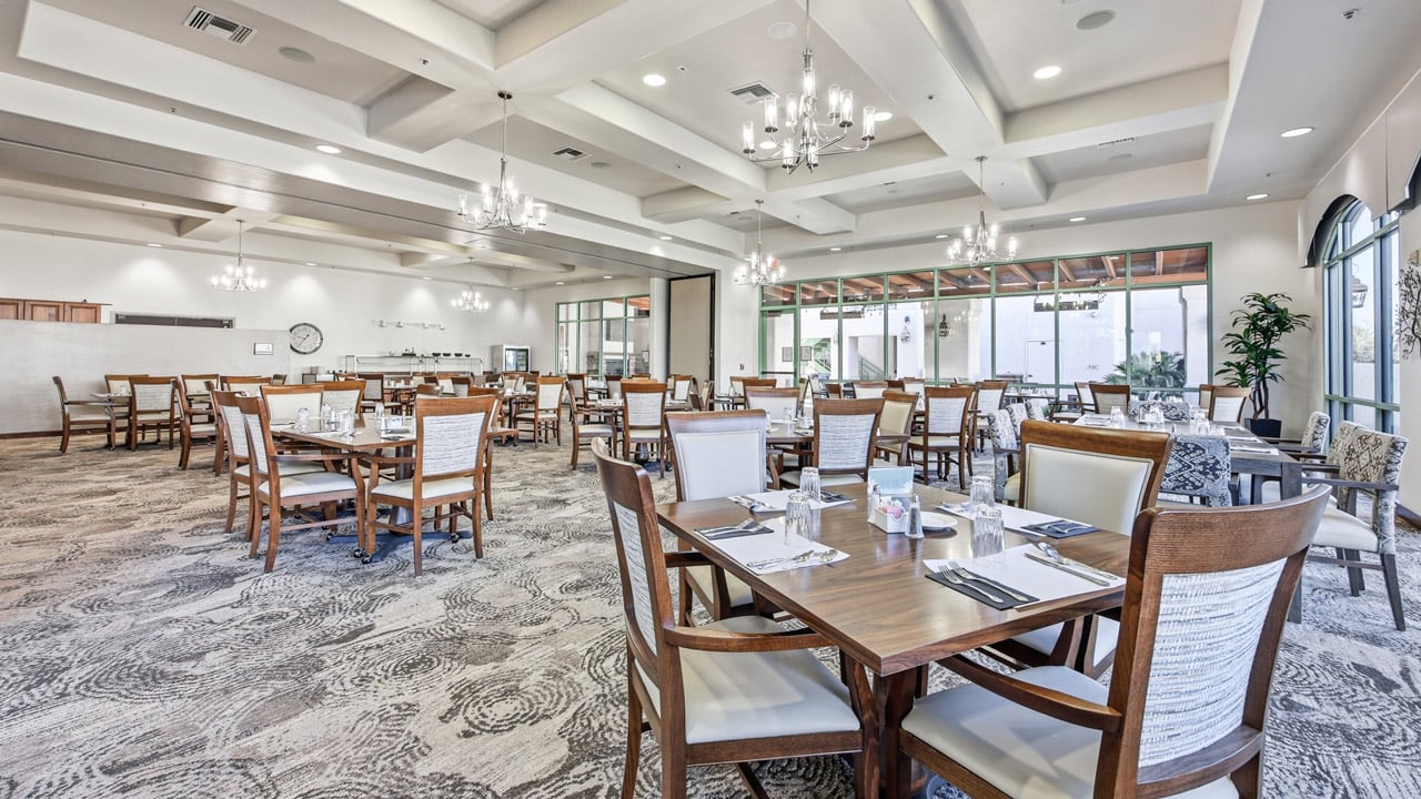The dining room at The Peaks at Santa Rita set for mealtime