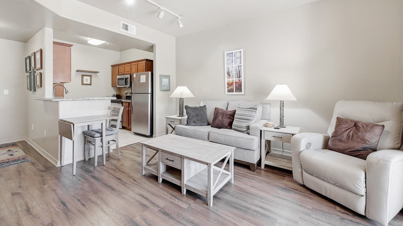 A living room in a The Peaks at Santa Rita apartment