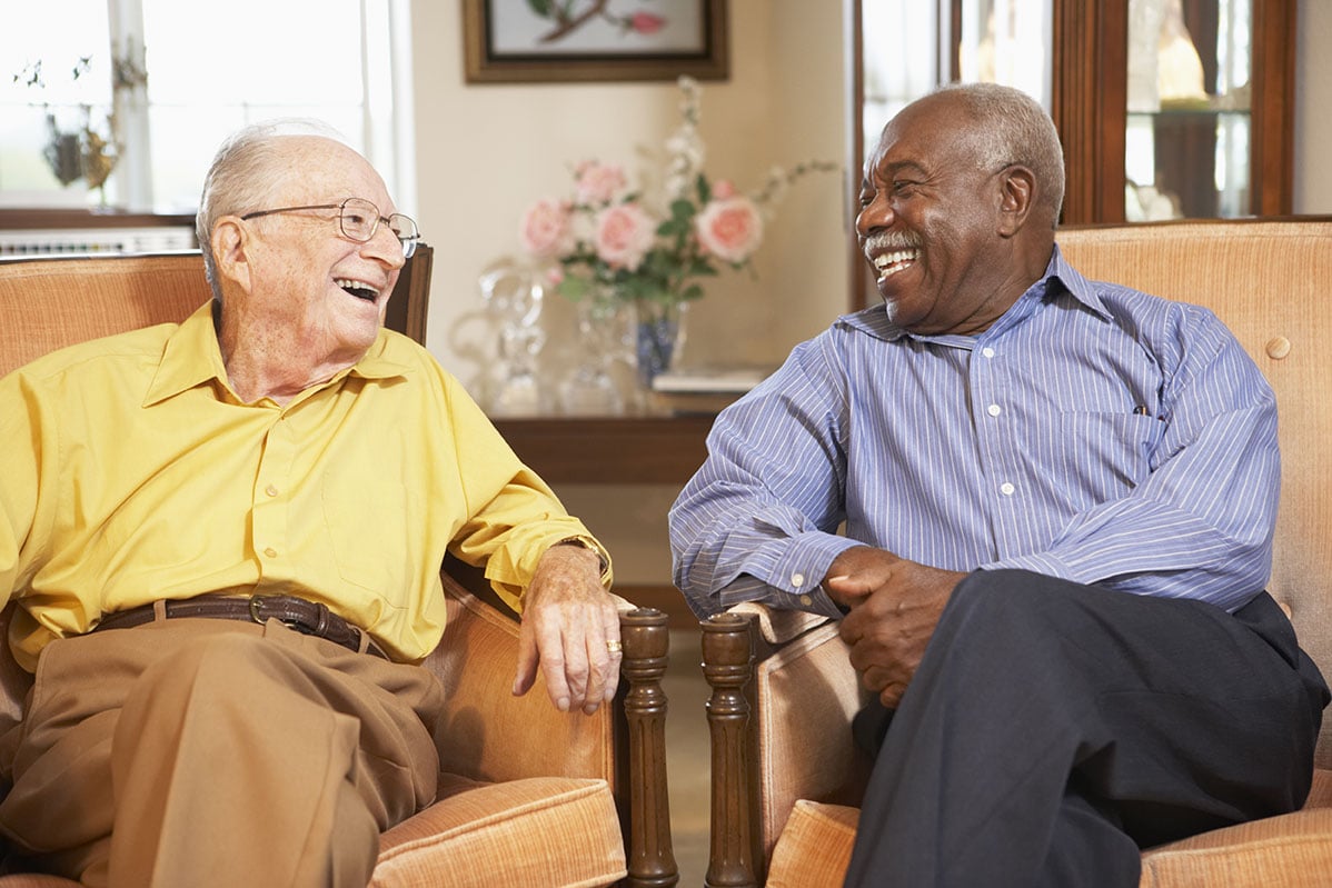 Residents laughing together at The Peaks at Santa Rita
